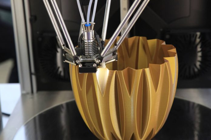 What is the maximum size build for an additive manufacturing system?