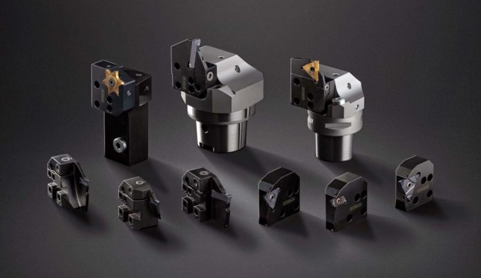 Horn expands cartridge tooling system for grooving and parting-off